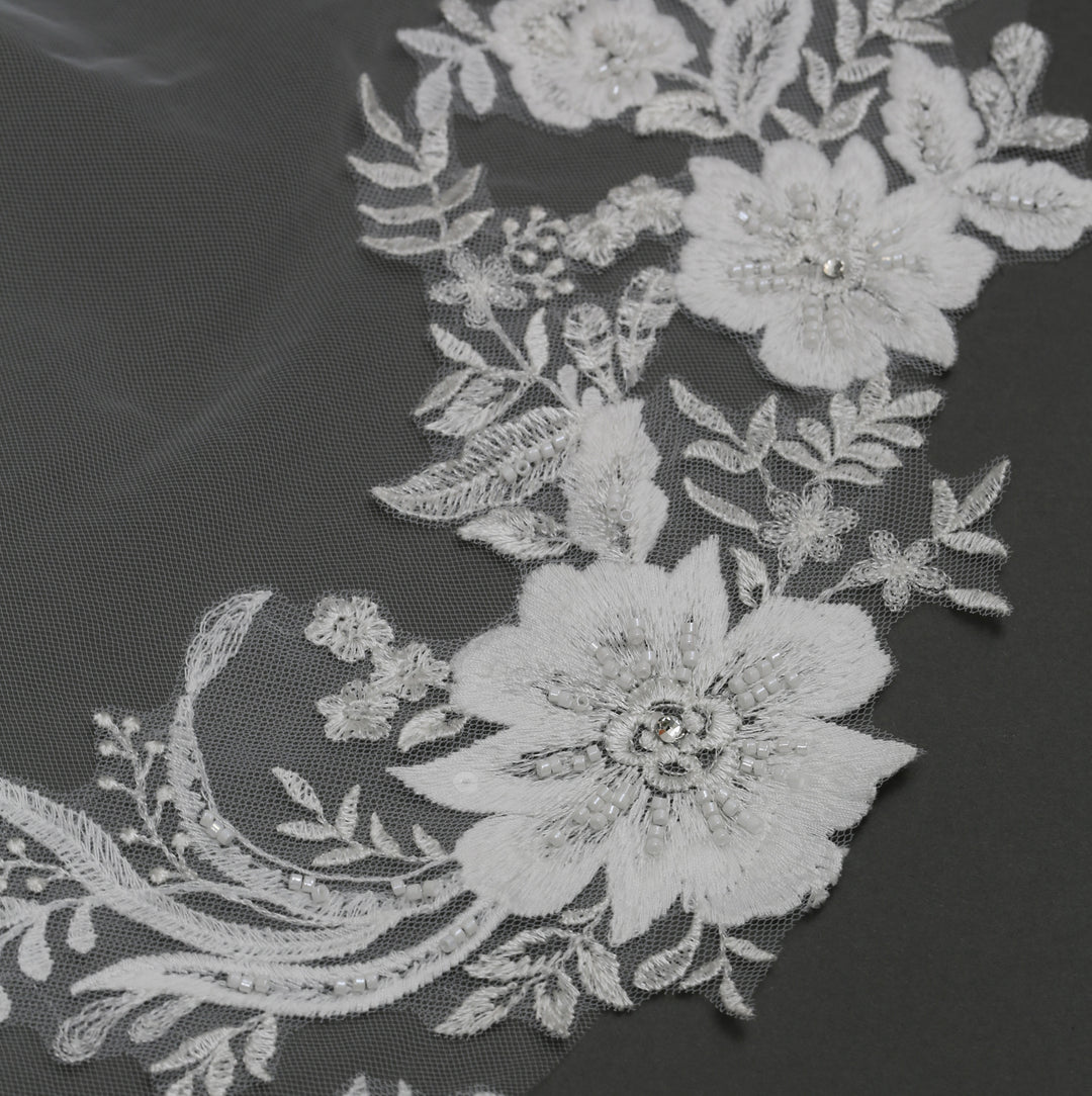 Detail of FS6225 lace veil with intricate embroidery and pearls.