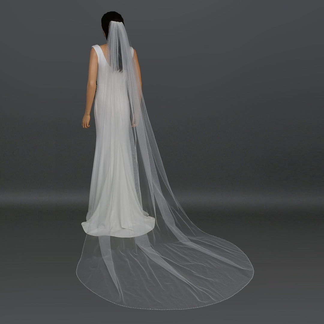 Side view of FS6260 showcasing scalloped lace edges and elegant flow.