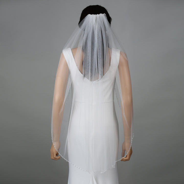 FS6263 bridal veil styled on mannequin, highlighting mid-length design.