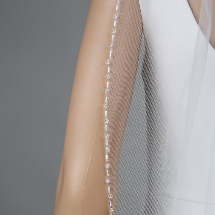 Detail of FS6263 floral lace veil with bead and sequin embellishments.