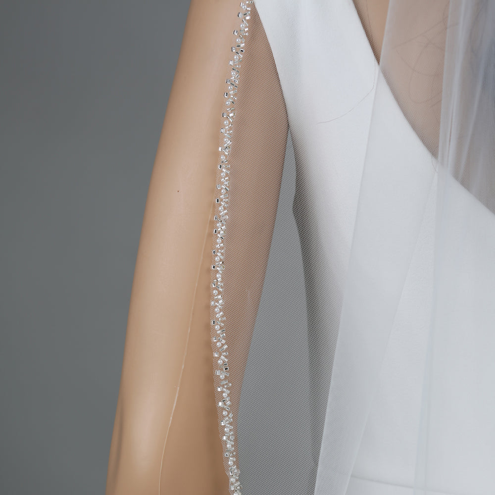 Detail of FS6265 floral lace veil with bead and sequin embellishments.