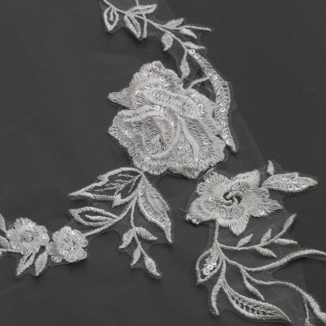 FS6277 rear view showcasing dramatic flow and intricate embroidery.
