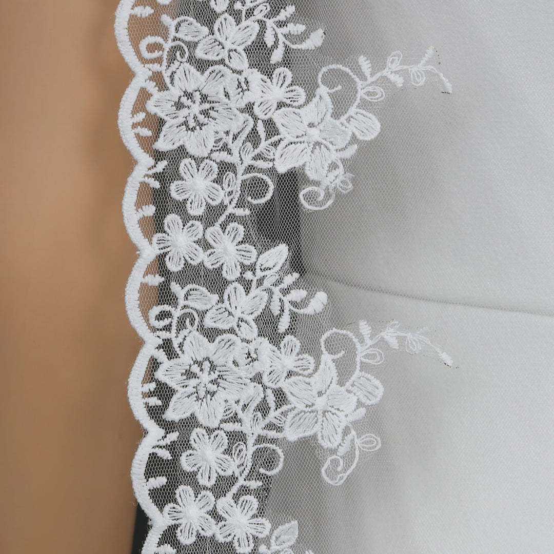 FS6296 bridal veil styled on mannequin, highlighting chapel-length design.