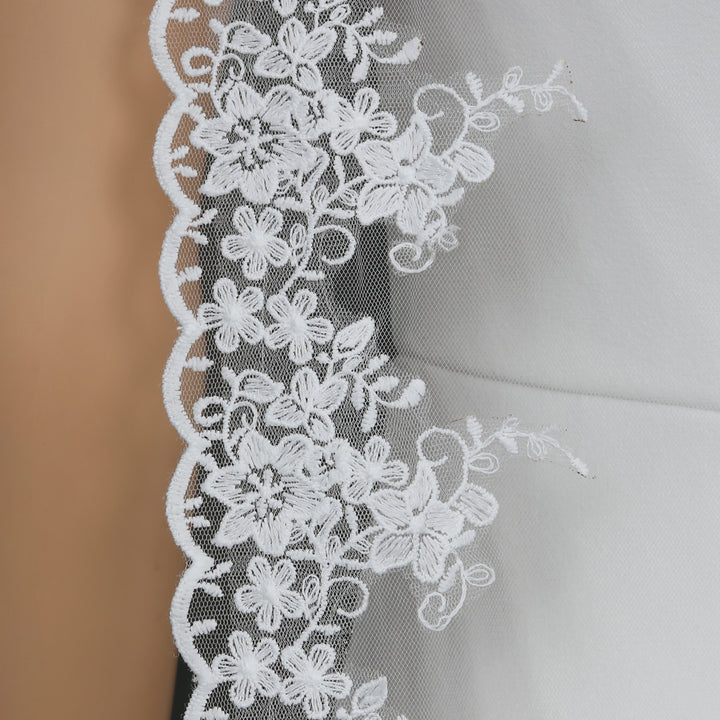 FS6296 bridal veil styled on mannequin, highlighting chapel-length design.