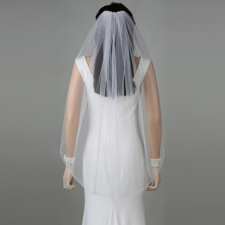 FS6330 bridal veil styled on mannequin, highlighting its dramatic length.