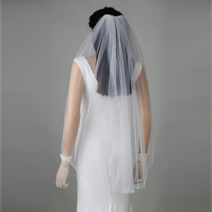Detail of FS6330 lace veil with bead and pearl embellishments.