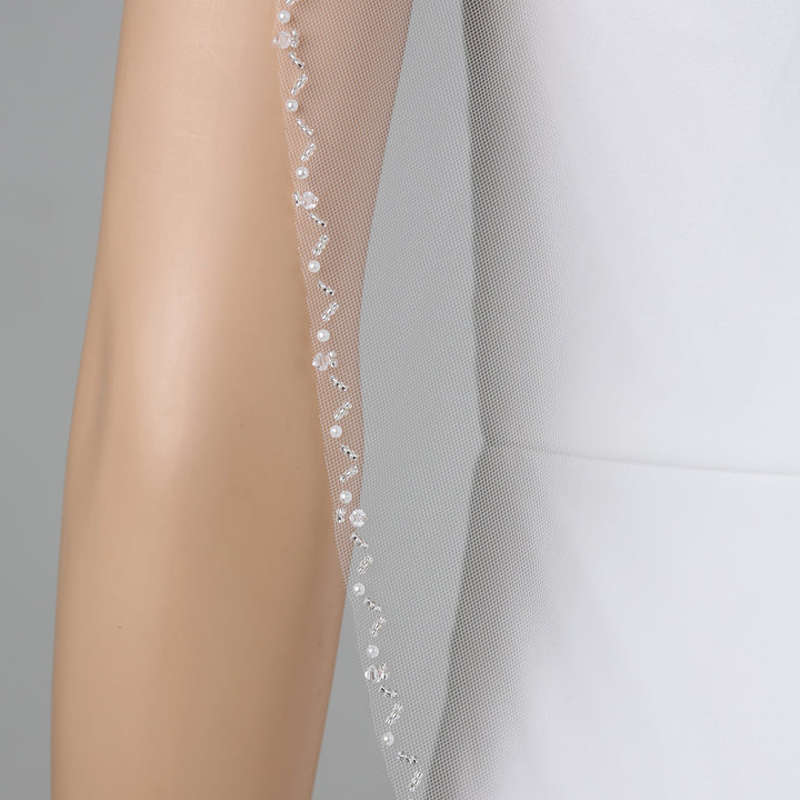Detail of FS6331 lace veil with bead and crystal embellishments.