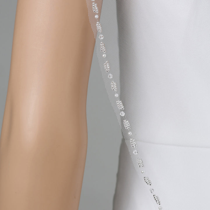 FS6334 veil comb attachment close-up with tulle wrapping.