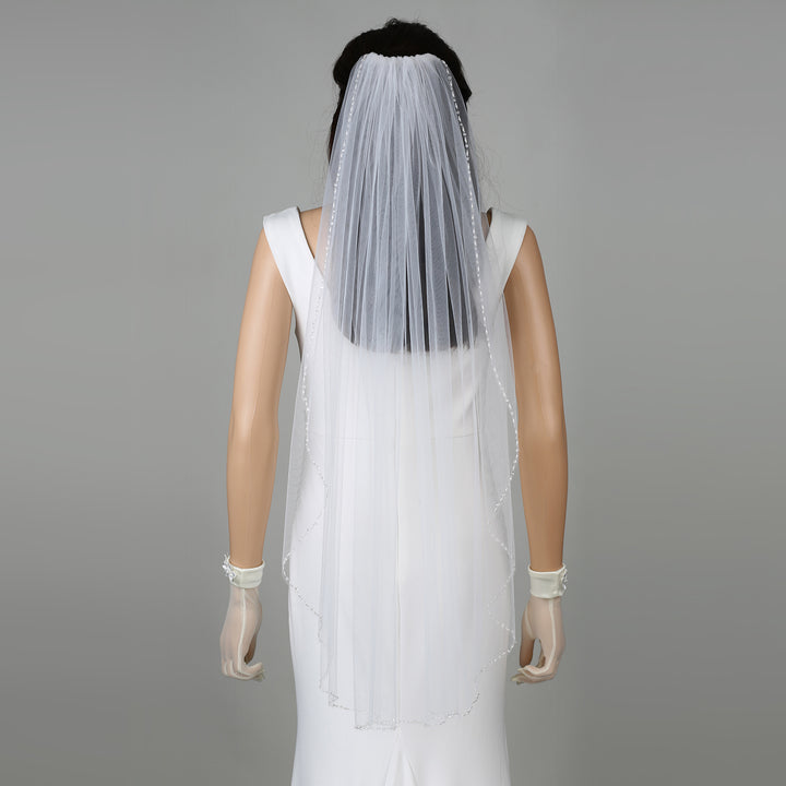 Side view of FS6335 veil showcasing scalloped edges and elegant drape.