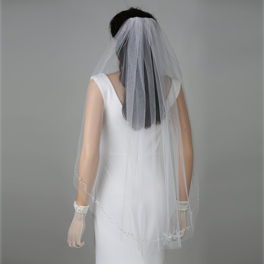 FS6341 bridal veil styled on mannequin, highlighting mid-length design.
