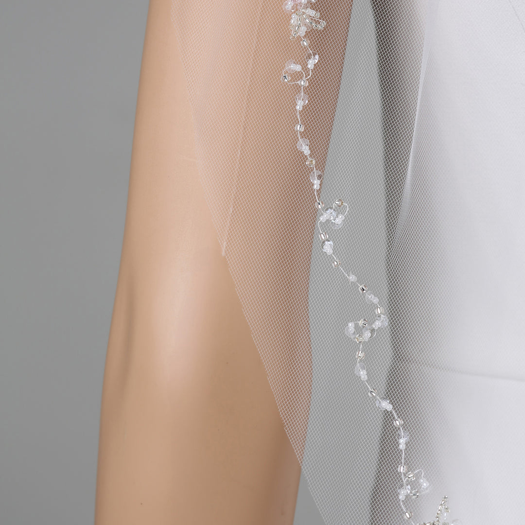 Detail of FS6341 lace veil with bead and sequin embellishments.