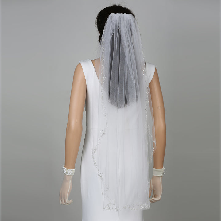 FS6342 bridal veil styled on mannequin, showcasing lace detailing.