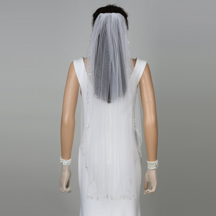 Side view of FS6342 veil highlighting scalloped edges and elegant flow.