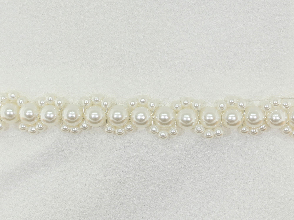 Close-up of S1005 detailing with bead and rhinestone accents.