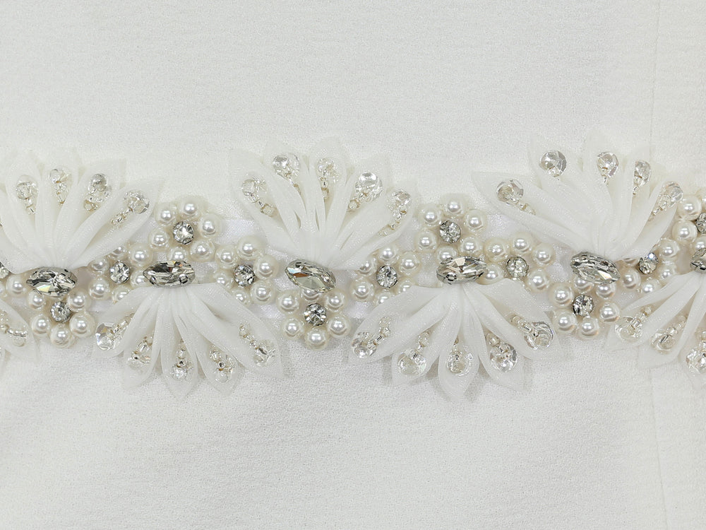 Close-up of S1006 detailing with rhinestones and pearls.