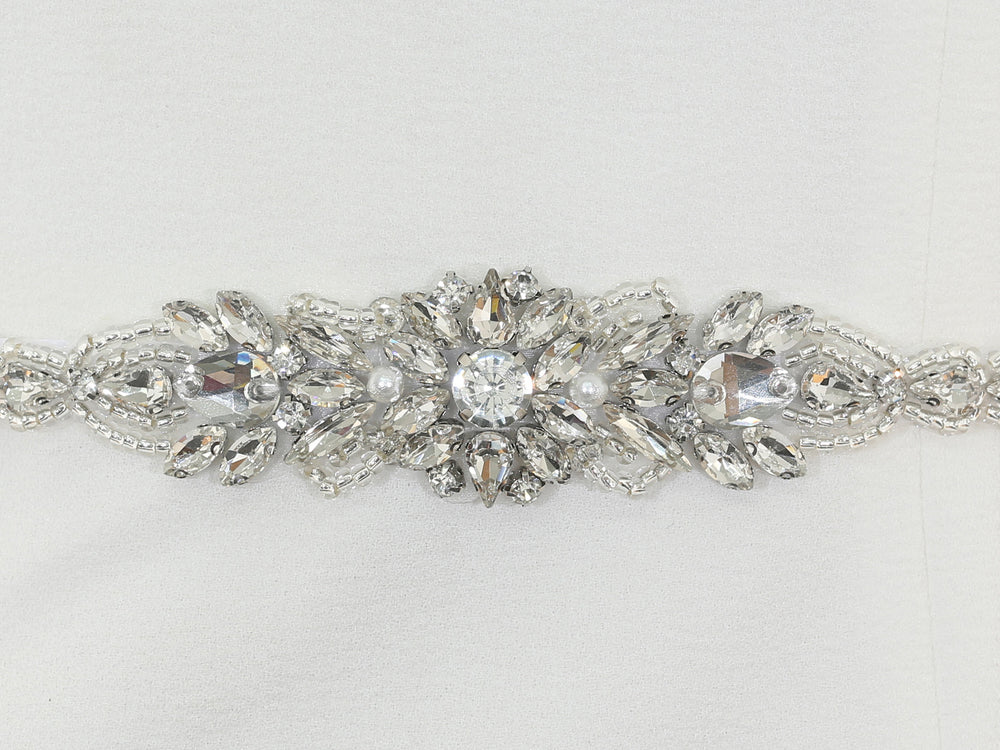Close-up of S1007 detailing with bead and rhinestone embellishments.