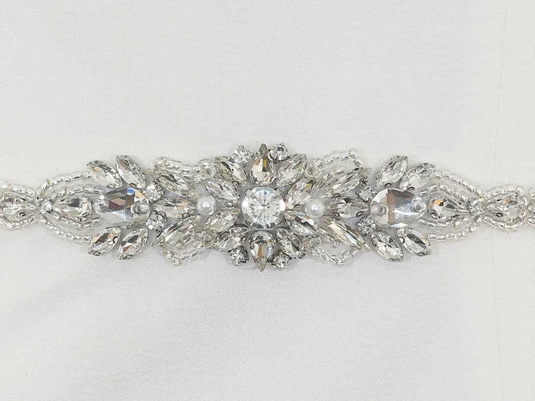 Close-up of S1007 detailing with bead and rhinestone embellishments.