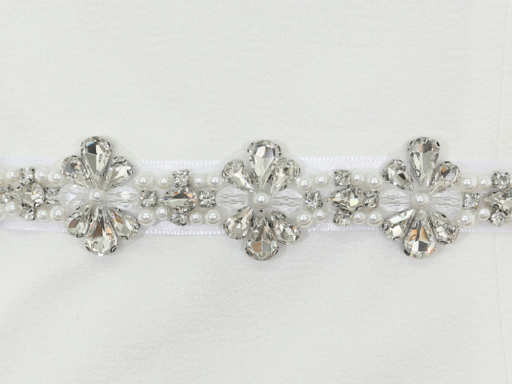 Close-up of S1008 detailing with bead and rhinestone accents.