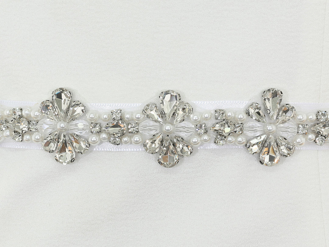 Close-up of S1008 detailing with bead and rhinestone accents.