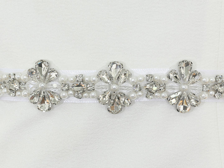 Close-up of S1008 detailing with bead and rhinestone accents.