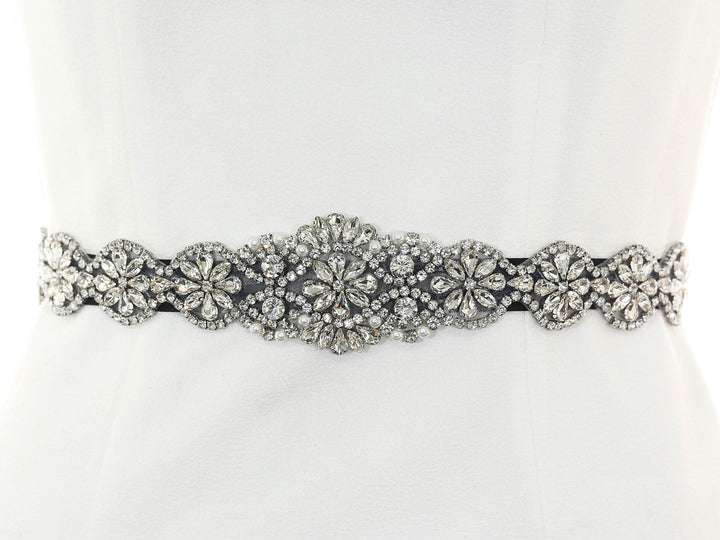 Side view of S1009 showcasing scalloped lace edges and dramatic flow.