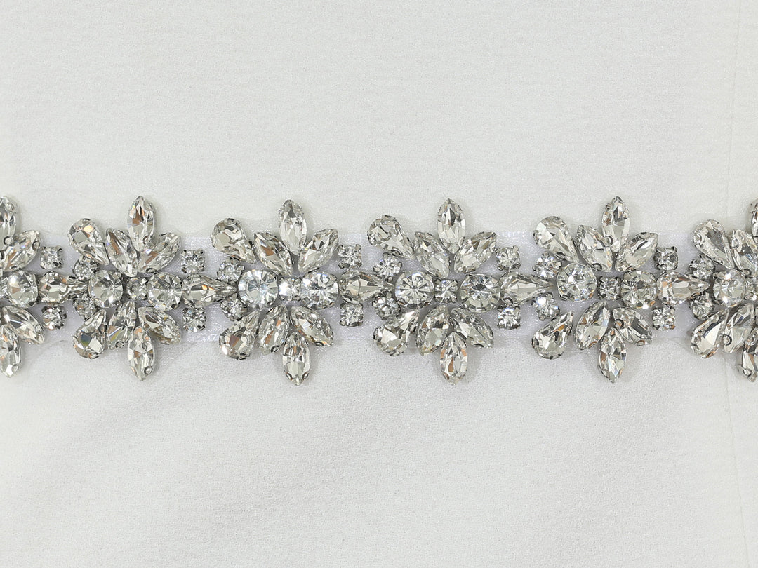 Close-up of S1011 detailing with rhinestones and pearls.