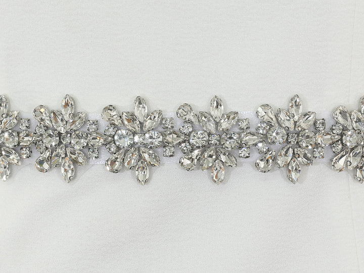 Close-up of S1011 detailing with rhinestones and pearls.