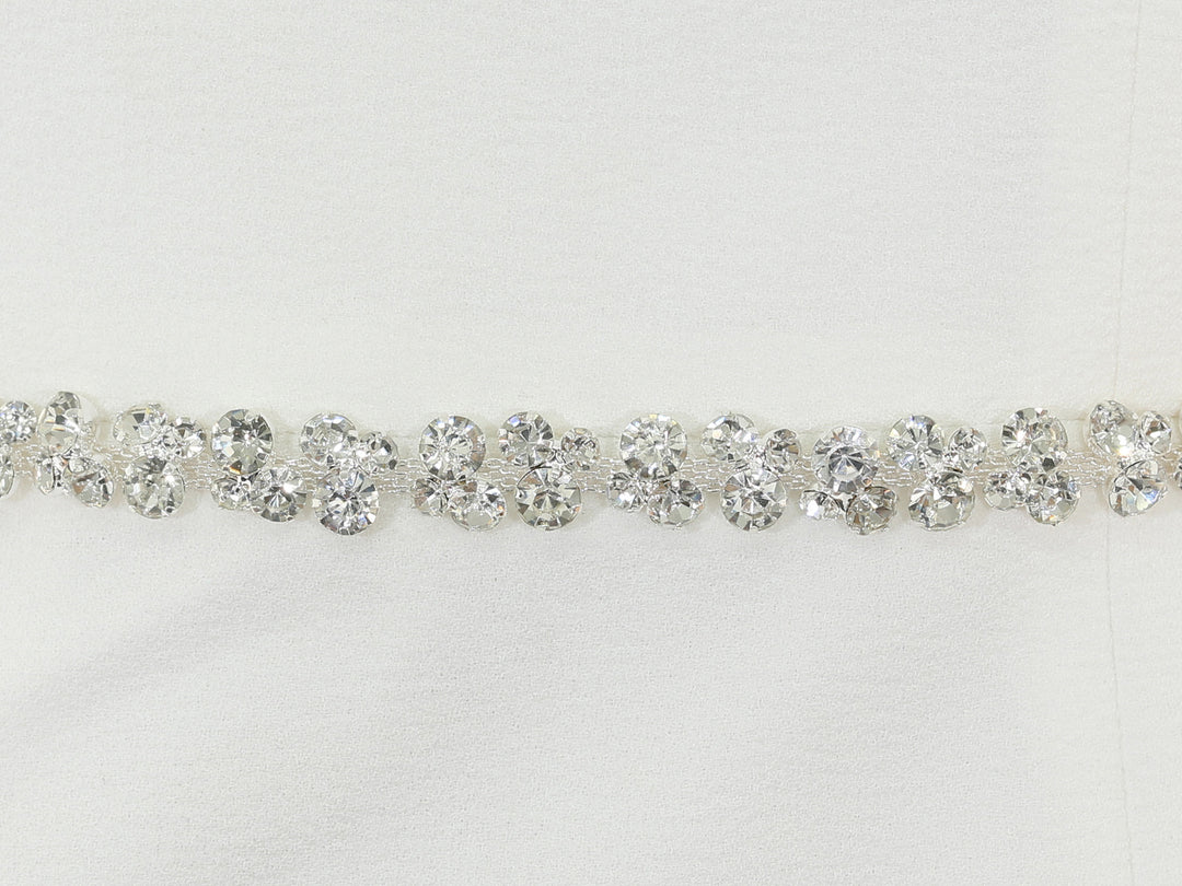 Close-up of S1014 detailing with bead and rhinestone embellishments.